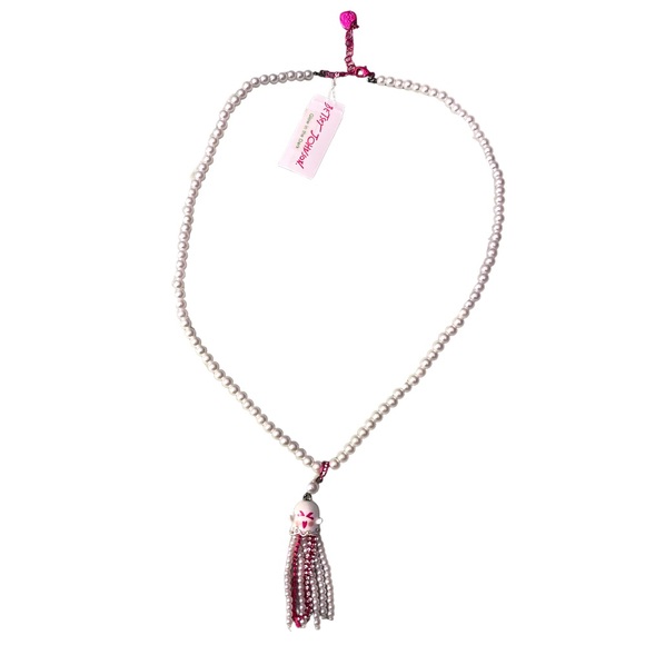 Betsey Johnson Ghost Fringe Pendant Long Necklace
Glow In The Dark White Fuchsia - Picture 2 of 4